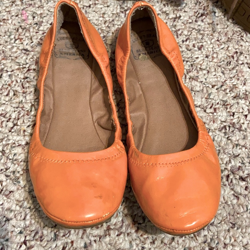 Women’s orange flats